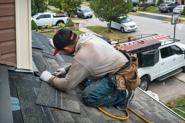 Professional Roofing technician working in Martinsville, VA